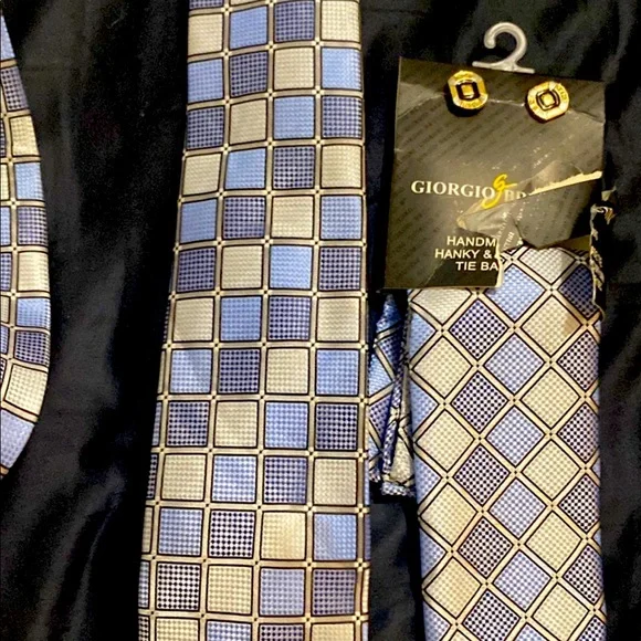 Brand new tie and cufflinks also comes with handkerchief